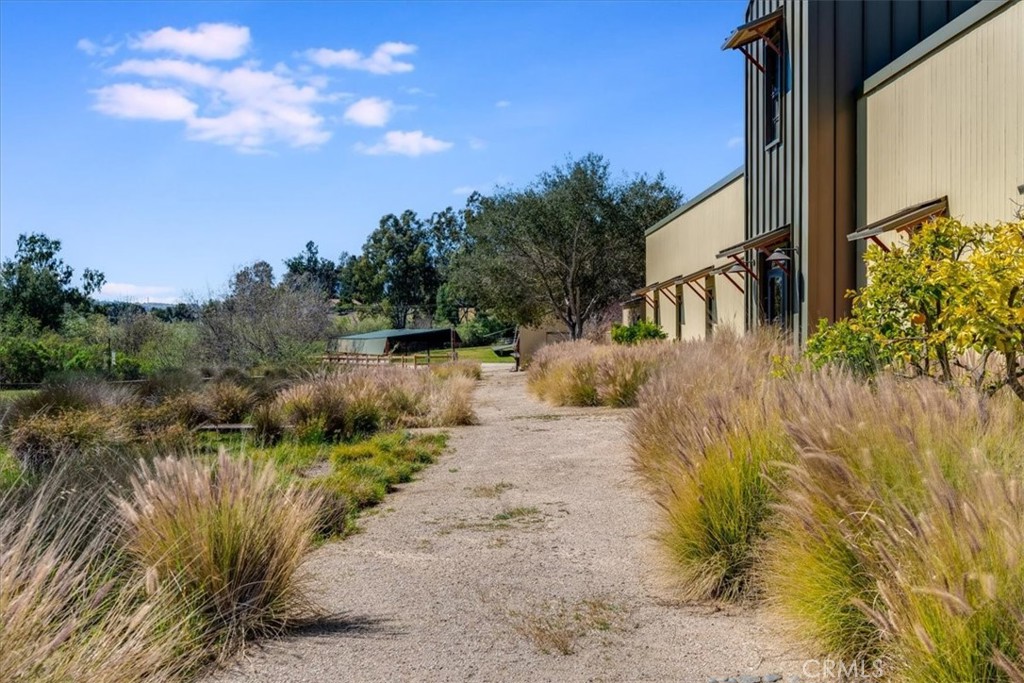 1604 Tiffany Ranch Road Arroyo Grande, CA 93420 - Photo 29 of 32 a view of backyard of house and car parked