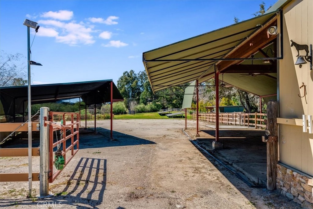 1604 Tiffany Ranch Road Arroyo Grande, CA 93420 - Photo 30 of 32 a view of a patio with a table and chairs