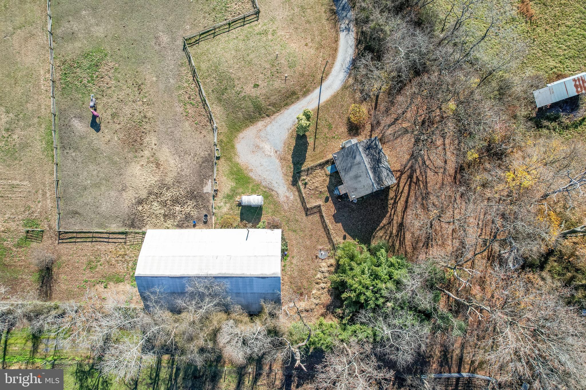 478 Highway 40 Elmer, NJ 08318 - Photo 18 of 65 an aerial view of a house with a yard and trees