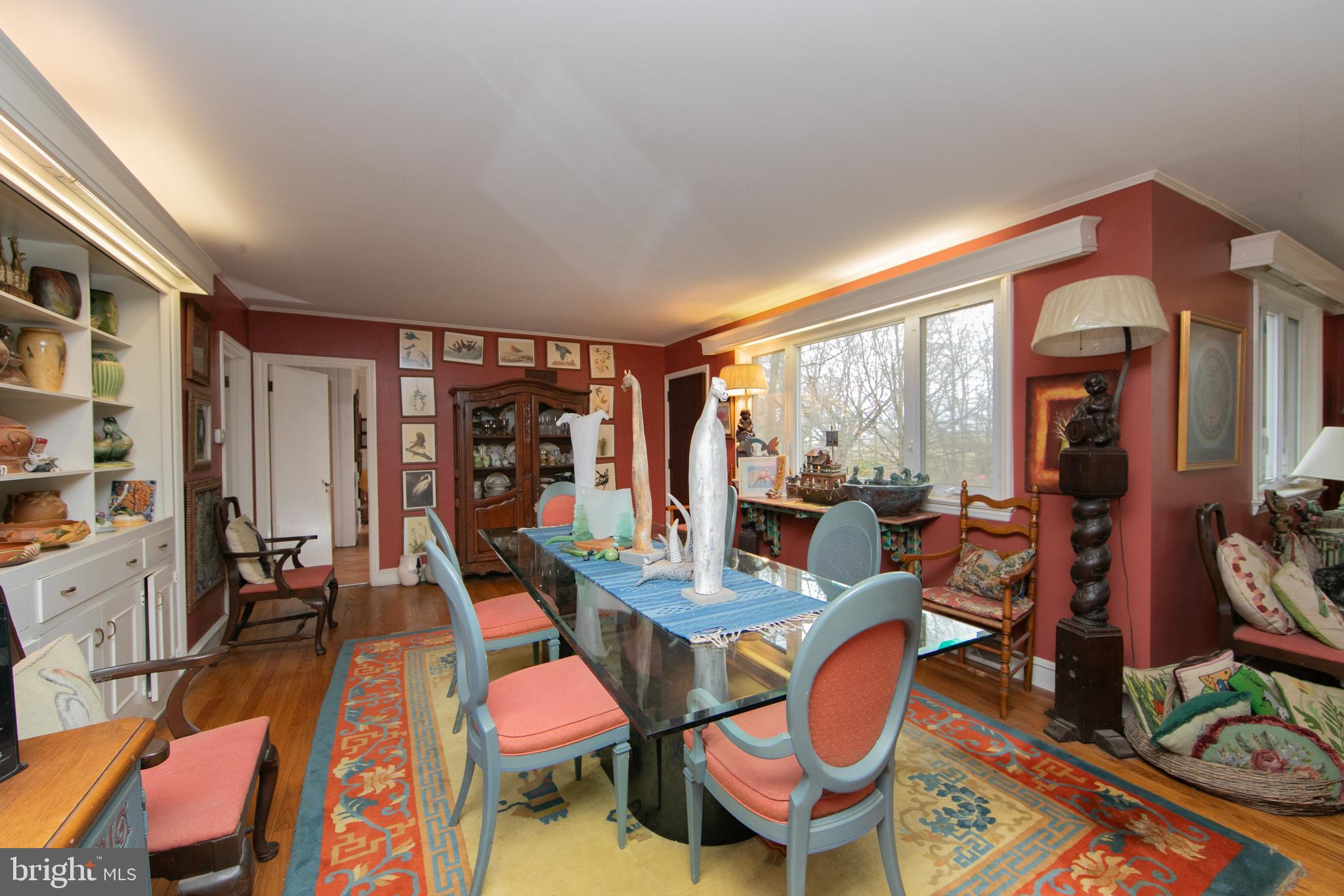478 Highway 40 Elmer, NJ 08318 - Photo 25 of 65 a view of a livingroom with furniture hardwood floor and a floor to ceiling window