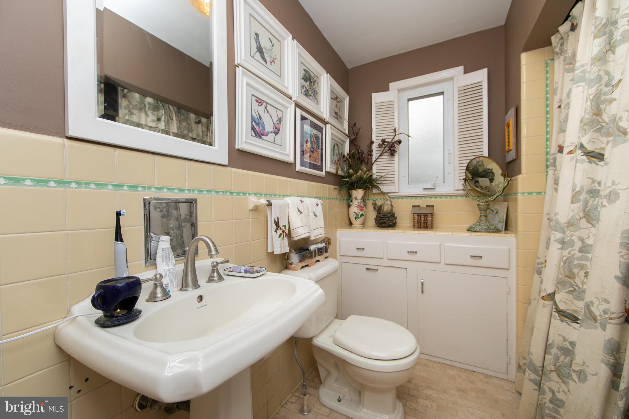 478 Highway 40 Elmer, NJ 08318 - Photo 40 of 65 a bathroom with a sink toilet and shower