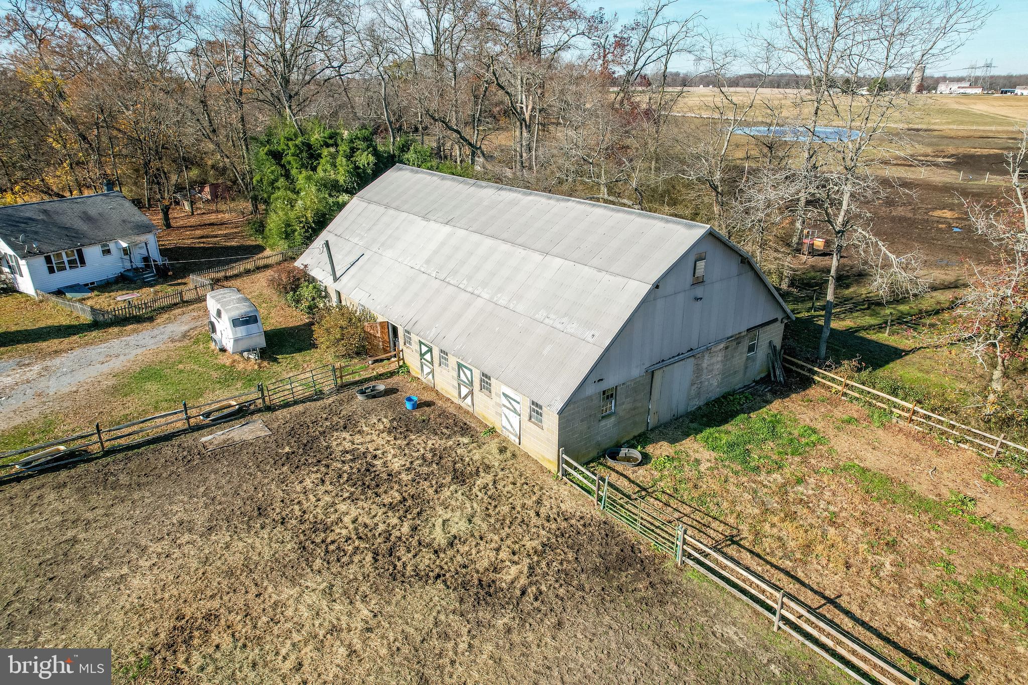 478 Highway 40 Elmer, NJ 08318 - Photo 10 of 65 a view of a backyard with wooden floor and lake view