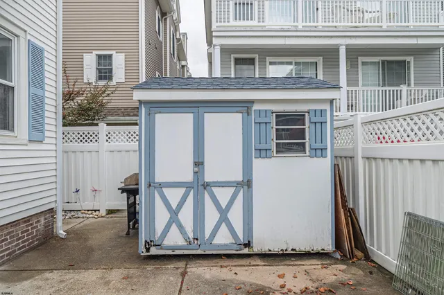 a view of entrance gate of a house