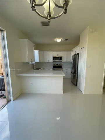 $469,000 | 7317 Northwest 174th Terrace, Unit 102, Hialeah, FL 33015