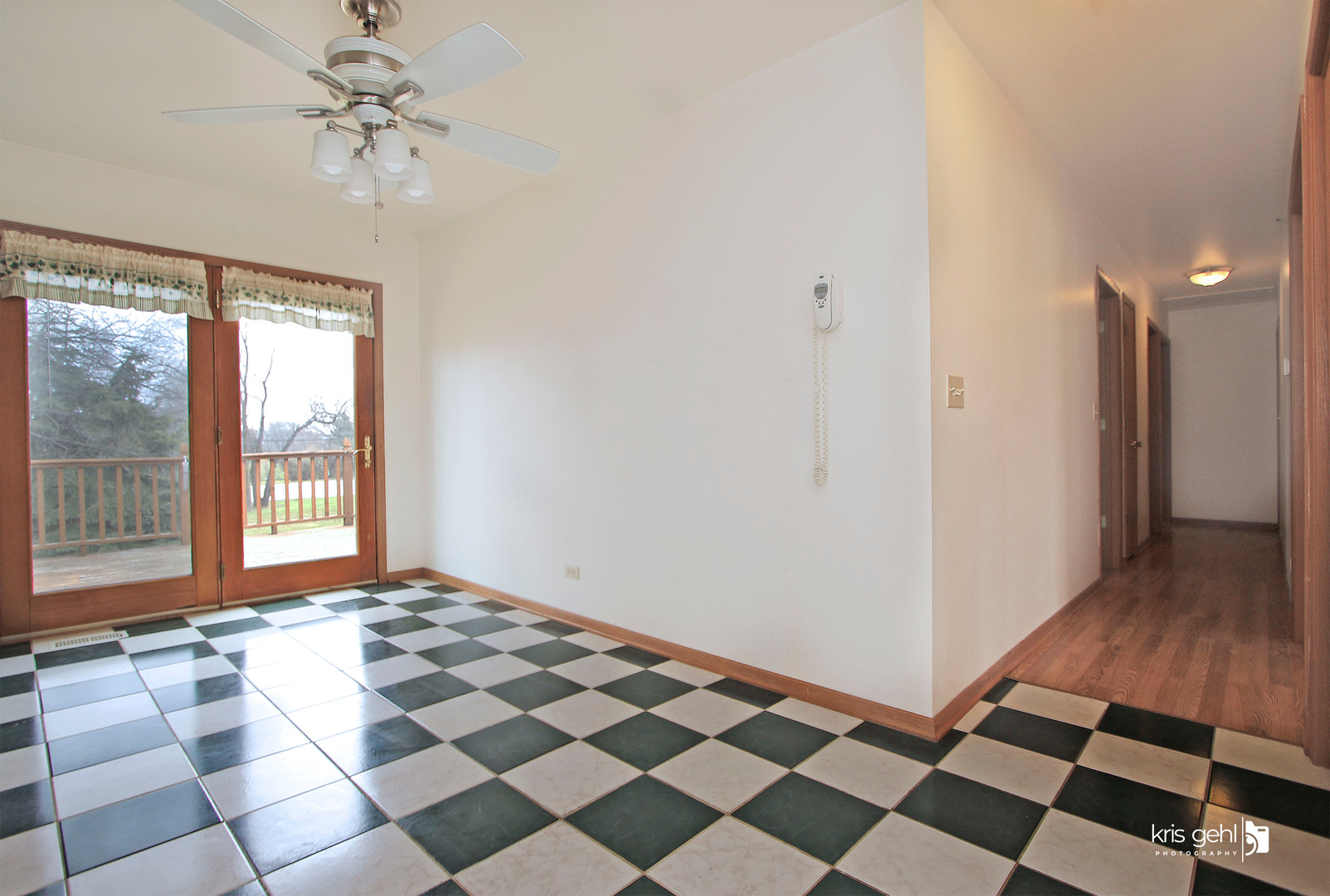 104 Cass Street Spring Grove, IL 60081 - Photo 8 of 21 a view of a livingroom with a black and white checkered floor