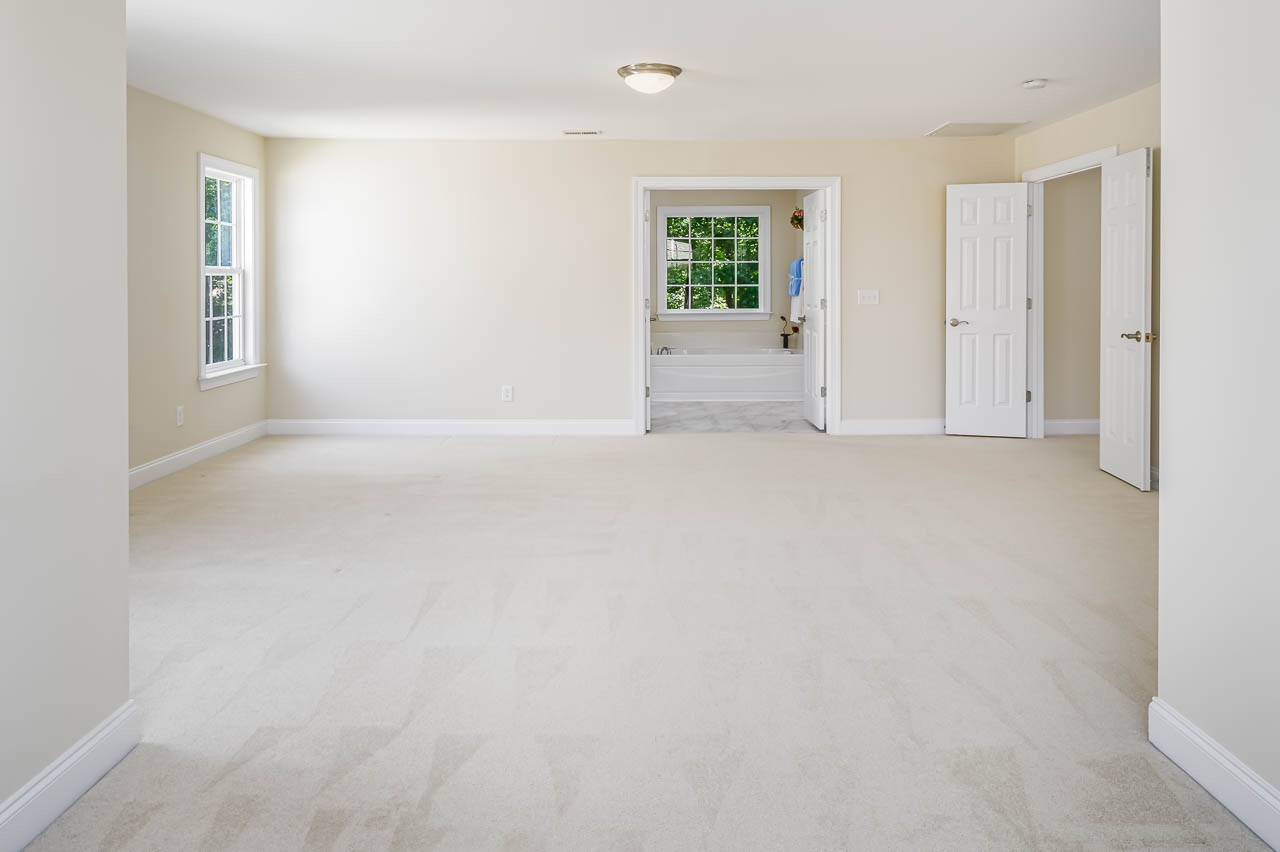 209 Quarryrock Road Holly Springs, NC 27540 - Photo 17 of 30 Master Bedroom
