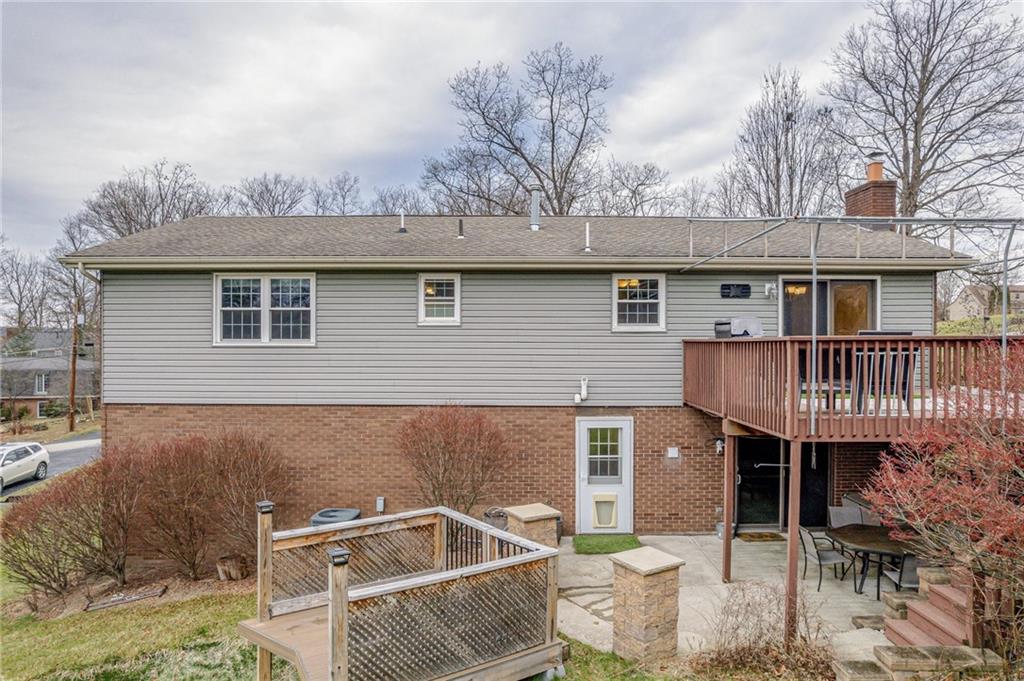 162 Hermitage Circle Ligonier, PA 15658 - Photo 15 of 38 a side view of a house with a roof deck
