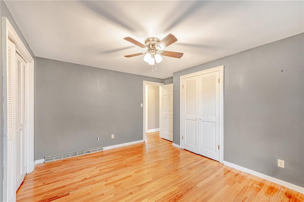 162 Hermitage Circle Ligonier, PA 15658 - Photo 27 of 38 a view of a room with a ceiling fan and wooden floor
