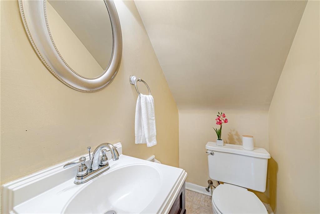 162 Hermitage Circle Ligonier, PA 15658 - Photo 29 of 38 a bathroom with a sink mirror vanity and toilet