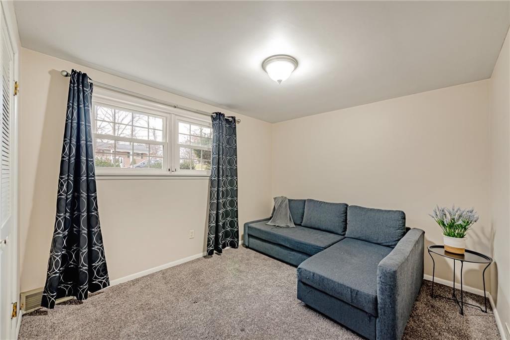 162 Hermitage Circle Ligonier, PA 15658 - Photo 30 of 38 a living room with furniture and a window