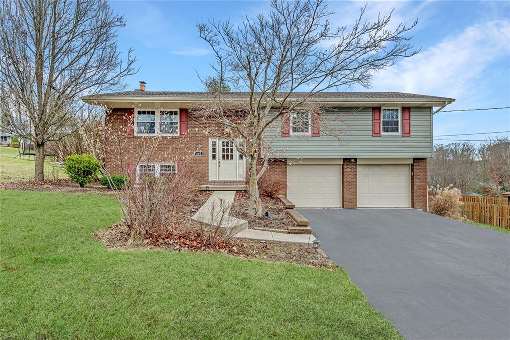 162 Hermitage Circle Ligonier, PA 15658 - Photo 37 of 38 a front view of a house with a garden