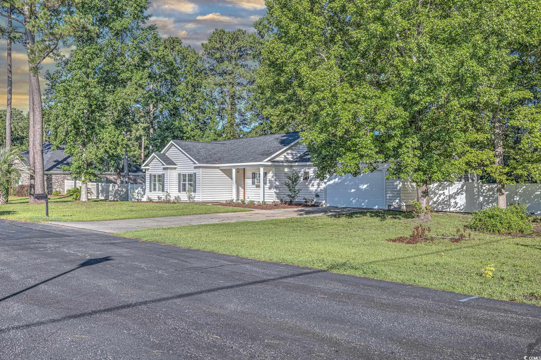 4000 Bayfield Loop Murrells Inlet, SC 29576 - Photo 2 of 33 Single story home featuring concrete driveway and an attached garage
