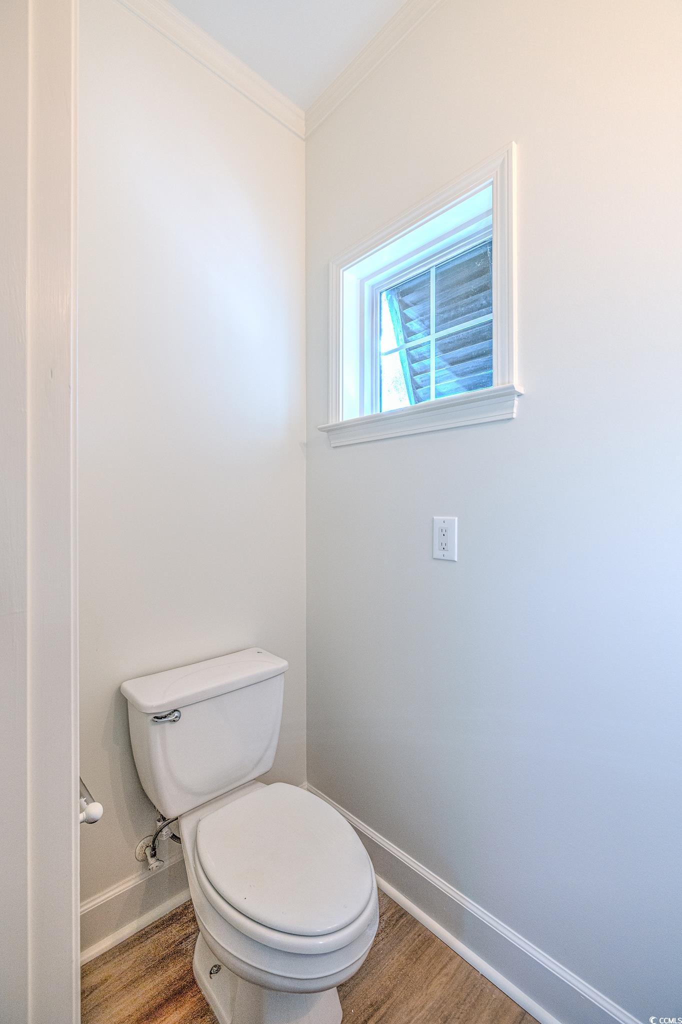 4000 Bayfield Loop Murrells Inlet, SC 29576 - Photo 21 of 33 Bathroom with wood finished floors and crown molding