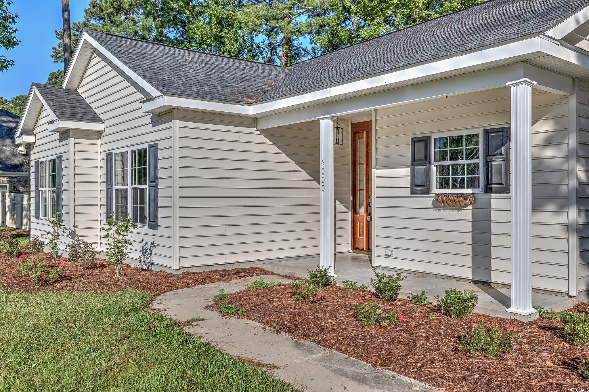 4000 Bayfield Loop Murrells Inlet, SC 29576 - Photo 4 of 33 View of front of home with roof with shingles