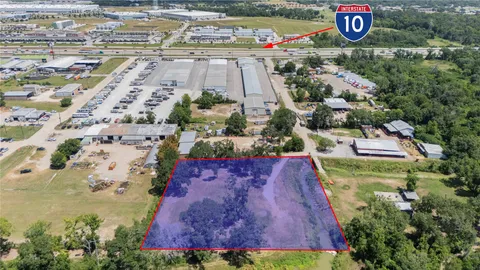 an aerial view of a city with mountains