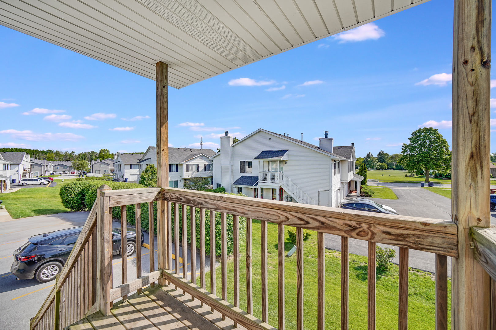 103 Red Barn Road, Unit 103 Matteson, IL 60443 - Photo 16 of 17 a view of a street from a balcony