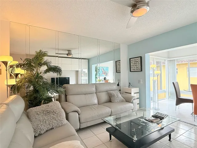 a living room with furniture and a couch