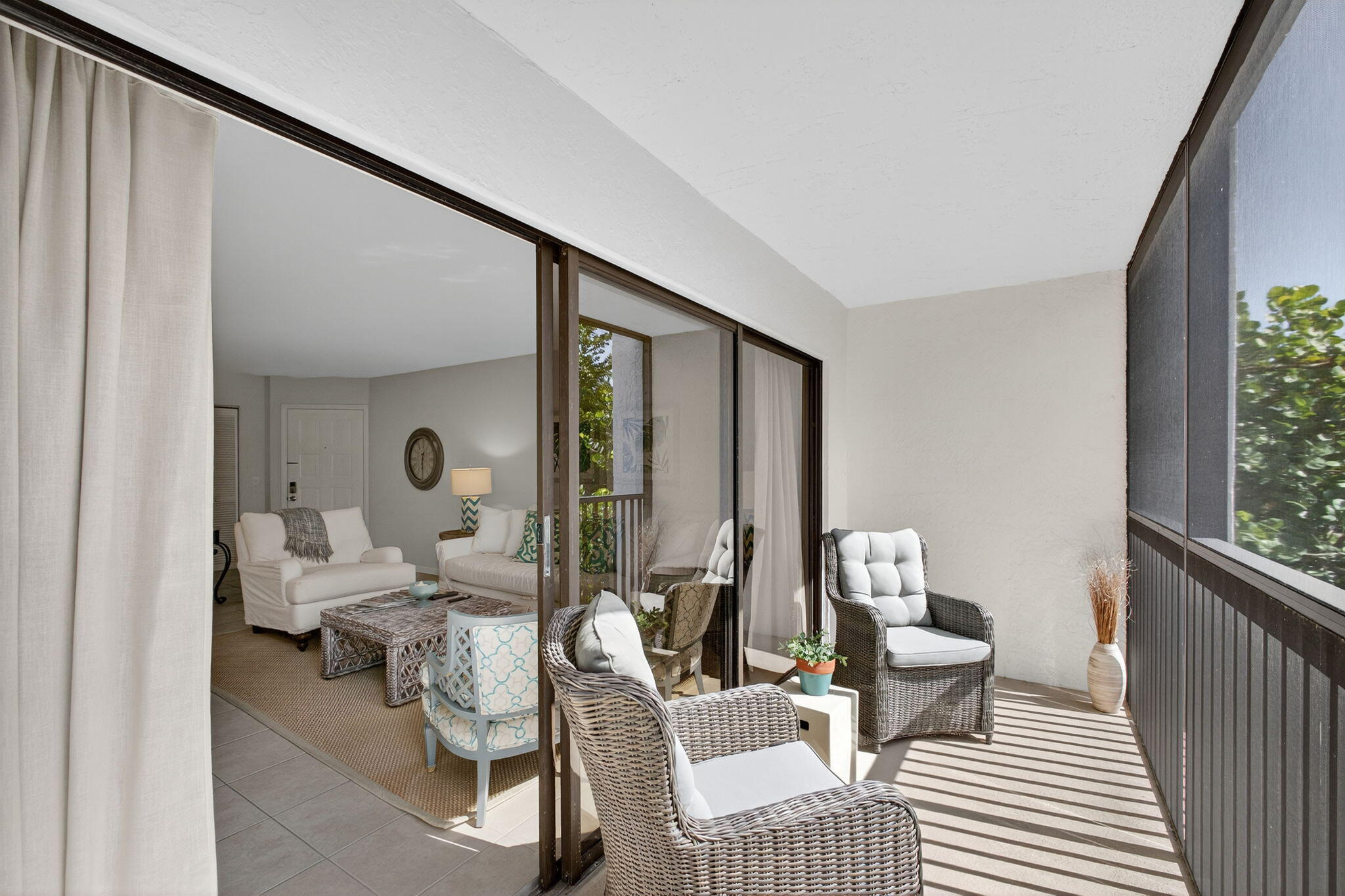 1605 Highway 1, Unit F204 Jupiter, FL 33477 - Photo 34 of 51 a living room with furniture and a window