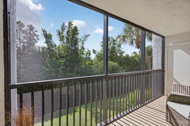 a view of a building with a potted plant