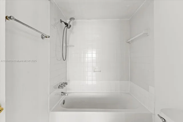 a close view of a bathtub in bathroom