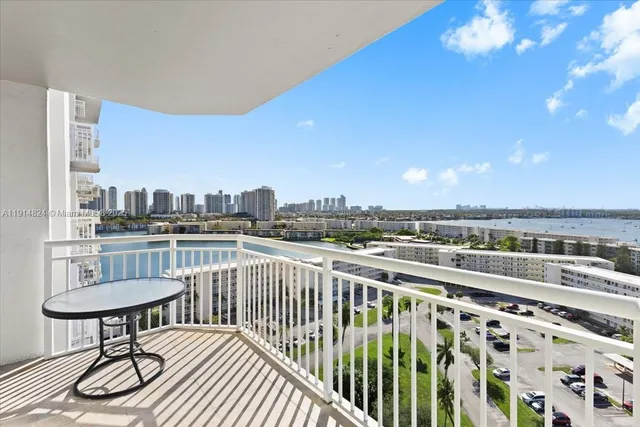 a view of balcony with wooden floor
