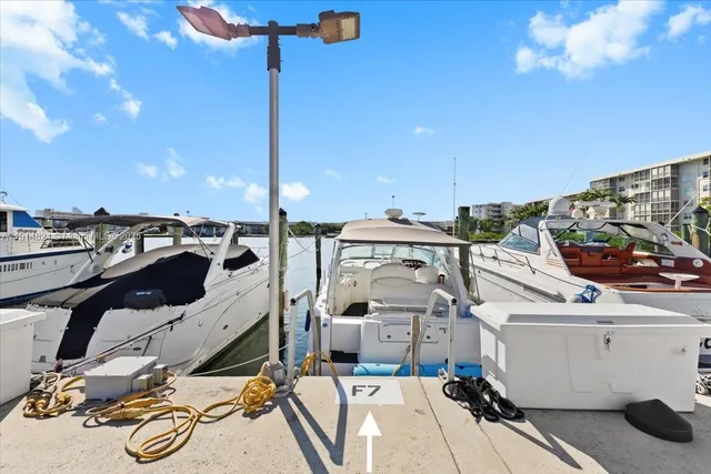 a view of a balcony with chairs