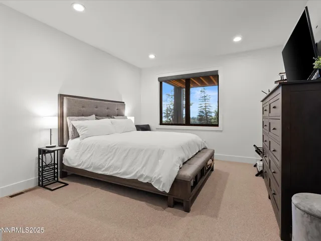 a view of a balcony with wooden floor