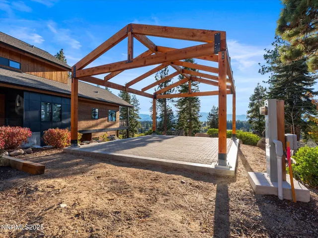an aerial view of a house with a big yard