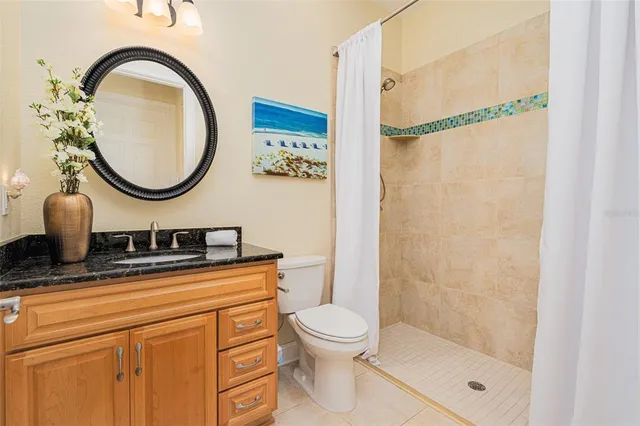 a bathroom with a double vanity sink mirror and double