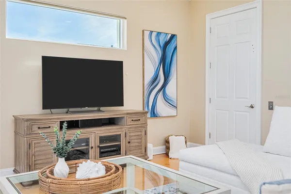 a bathroom with a sink and a window