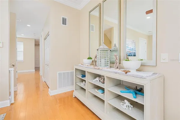 a bathroom with a granite countertop sink toilet and mirror