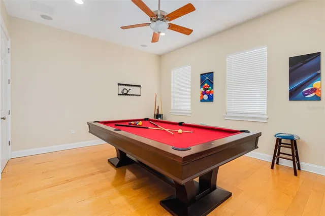 a view of a pathway of a house with potted plants