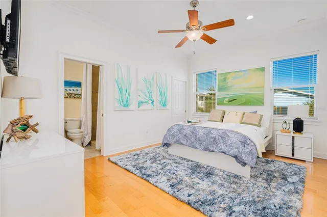 an aerial view of residential building and ocean