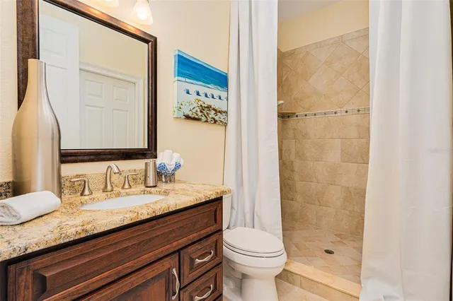 a view of a house with backyard and garden