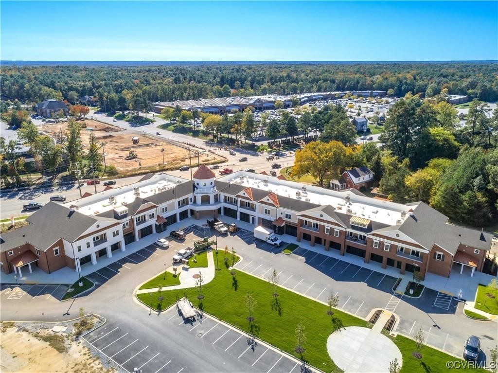 1504 Ewing Park Loop, Unit 202 Midlothian, VA 23113 - Photo 24 of 26 an aerial view of a swimming pool and outdoor space