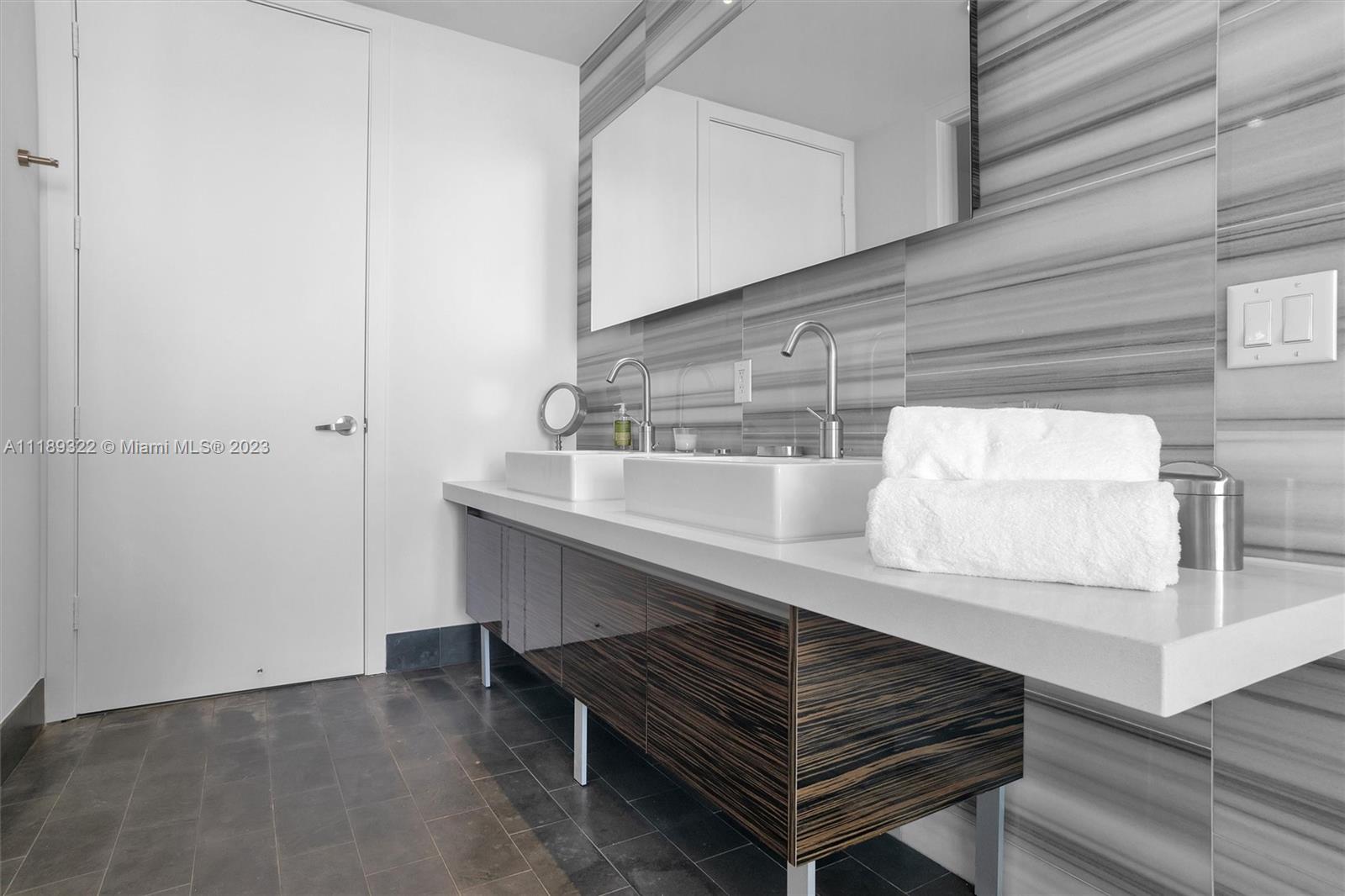 1100 Biscayne Boulevard, Unit 4204 Miami, FL 33132 - Photo 16 of 30 a close view of sink and tap