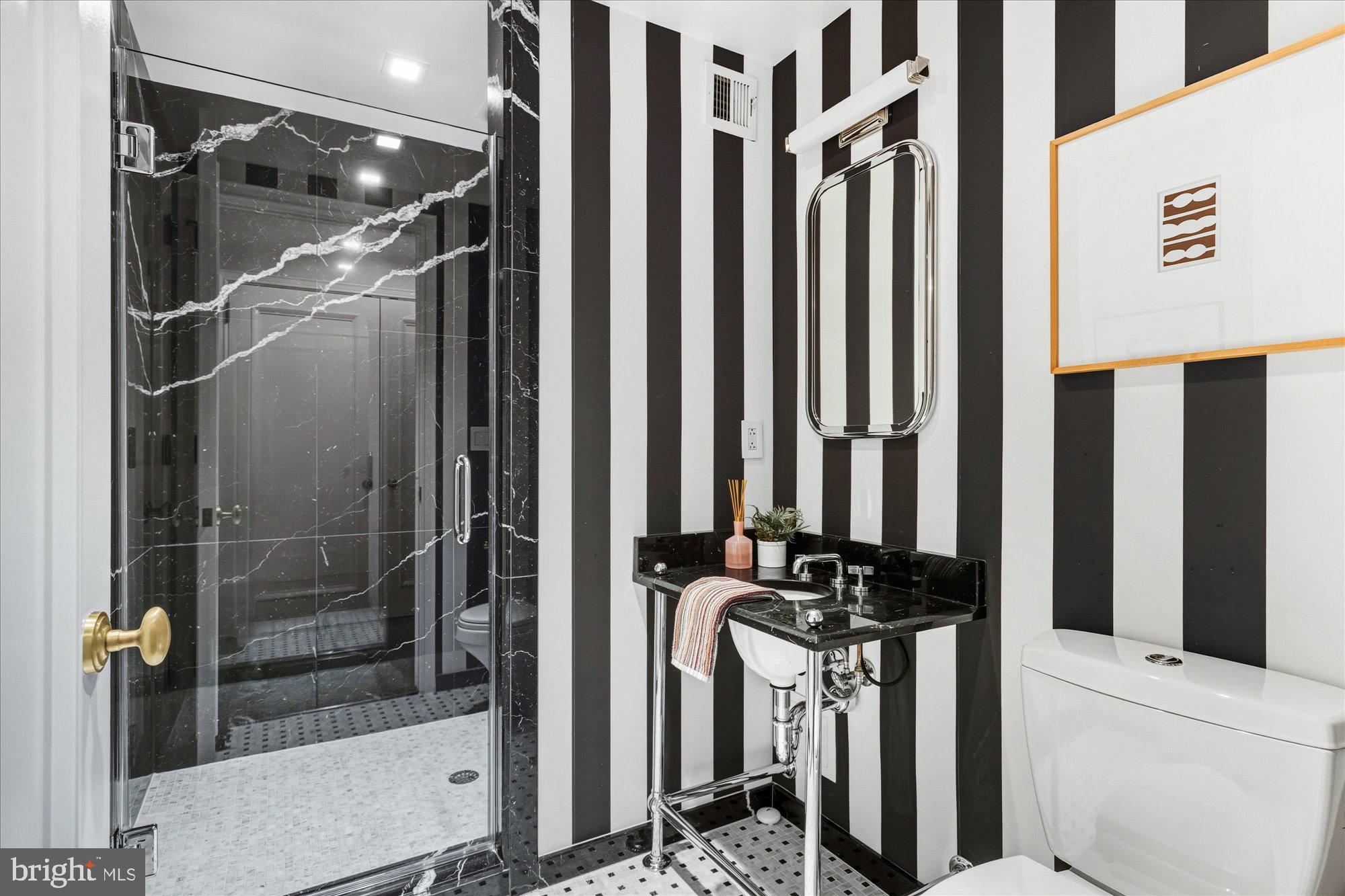 1155 23rd Street Northwest, Unit 8H Washington, DC 20037 - Photo 14 of 22 a view of walk in closet