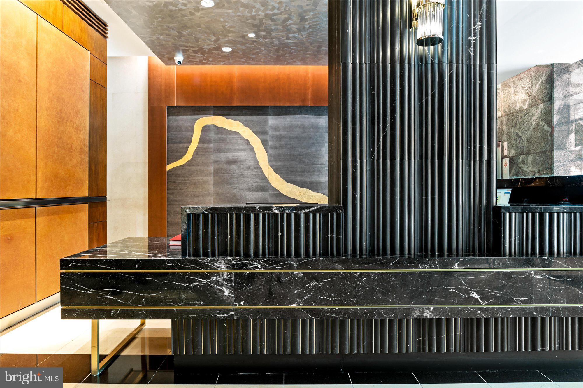 1155 23rd Street Northwest, Unit 8H Washington, DC 20037 - Photo 21 of 22 a view of a door with a chair