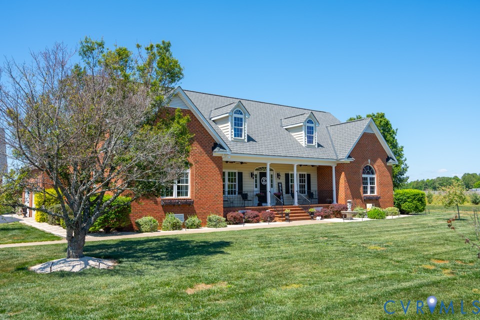 7191 Figuly Road Mechanicsville, VA 23111 - Photo 2 of 46 a front view of a house with garden