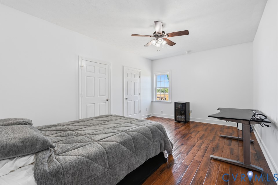7191 Figuly Road Mechanicsville, VA 23111 - Photo 23 of 46 a bedroom with a bed and a table