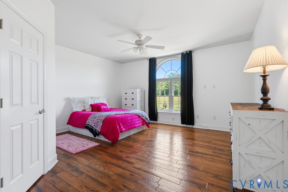 7191 Figuly Road Mechanicsville, VA 23111 - Photo 26 of 46 a bedroom with a bed and a window