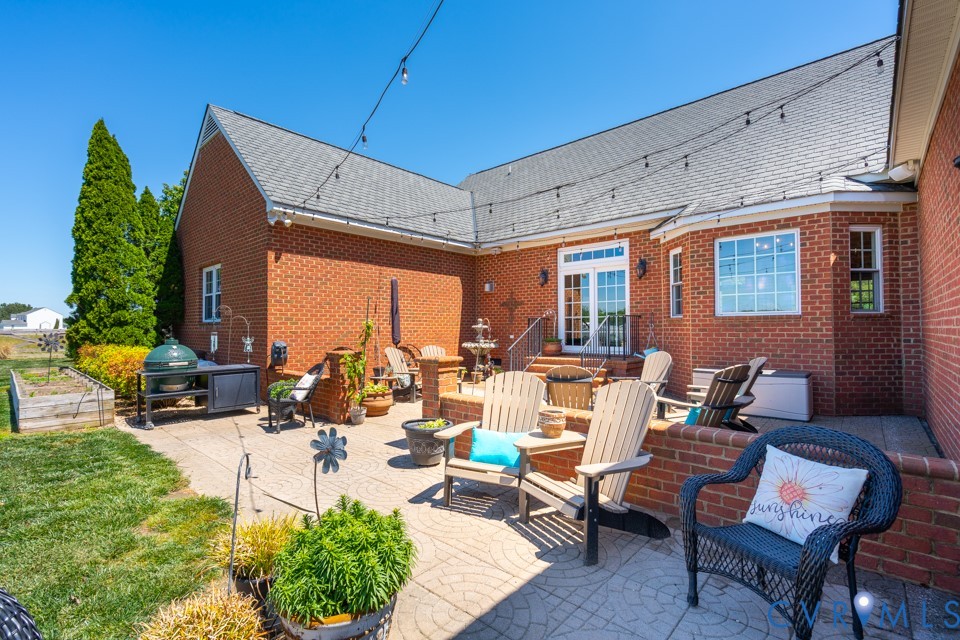 7191 Figuly Road Mechanicsville, VA 23111 - Photo 41 of 46 a outdoor space with patio the couches and a potted plant on the table