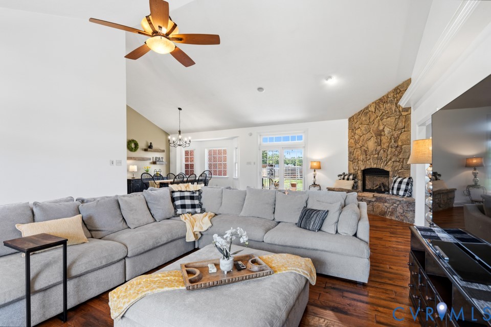 7191 Figuly Road Mechanicsville, VA 23111 - Photo 5 of 46 a living room with furniture a fireplace and a flat screen tv