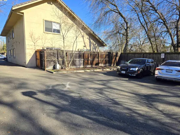 a view of a car park in front of a building
