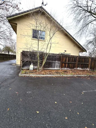 a small pool with a outdoor seating