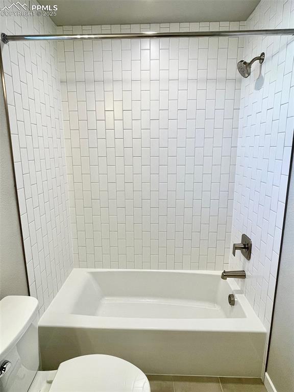 3527 Summer Dream Avenue Colorado Springs, CO 80922 - Photo 11 of 26 a bathroom with a shower and a toilet