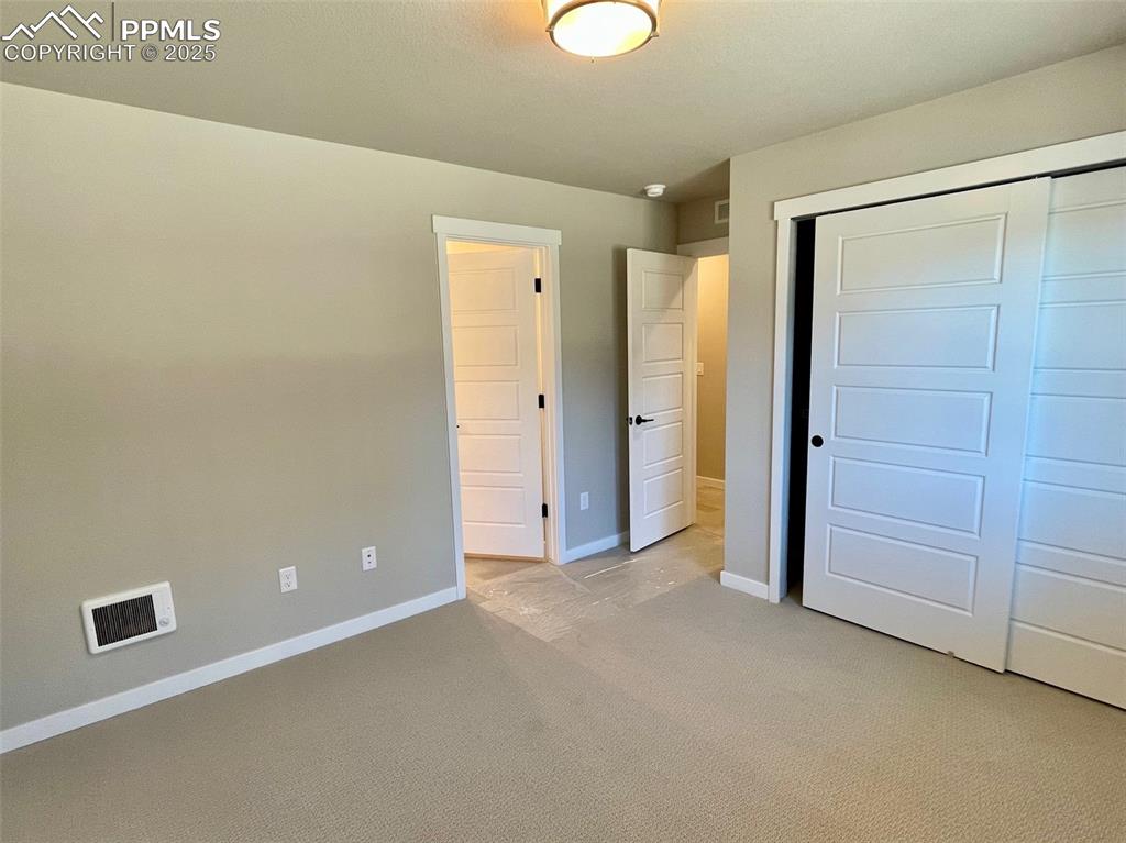3527 Summer Dream Avenue Colorado Springs, CO 80922 - Photo 16 of 26 a view of an empty room