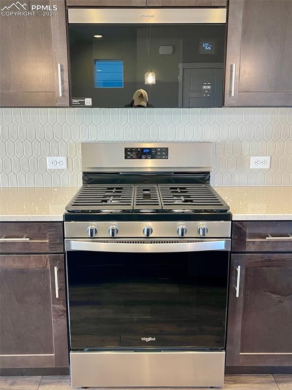 3527 Summer Dream Avenue Colorado Springs, CO 80922 - Photo 5 of 26 a stove top oven sitting inside of a kitchen