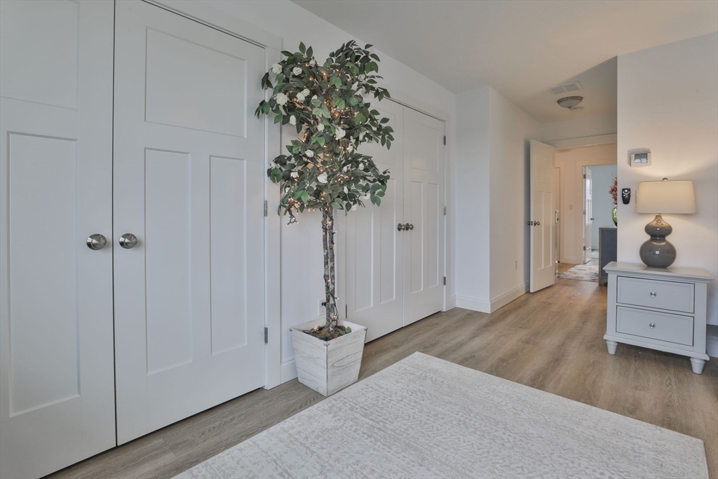 207 Beach Road, Unit C2 Salisbury, MA 01952 - Photo 30 of 35 wooden floor in an empty room