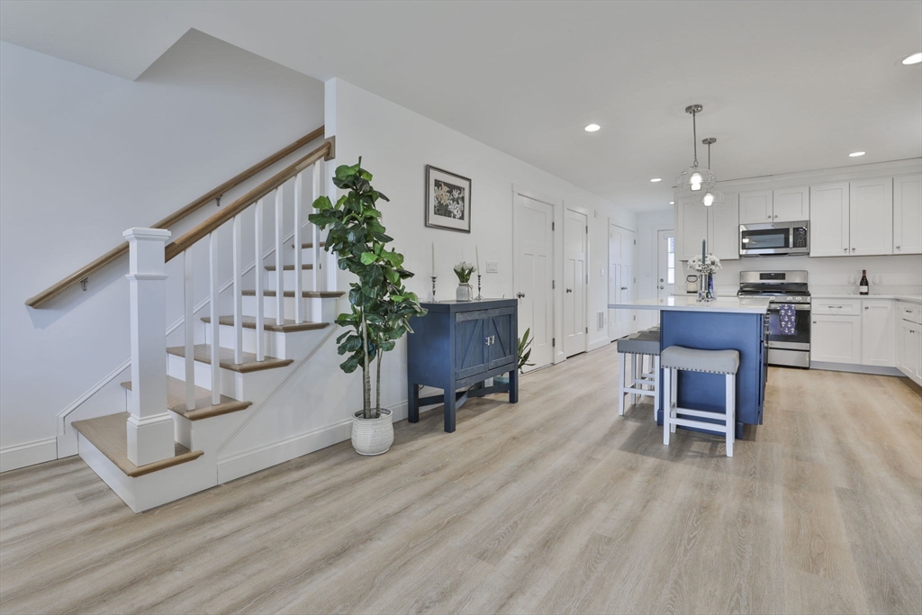 207 Beach Road, Unit C2 Salisbury, MA 01952 - Photo 3 of 35 a living room with furniture and a wooden floor